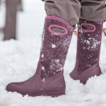 Winter boots covered in snow